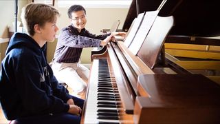Akira Ikegami teaching a piano student