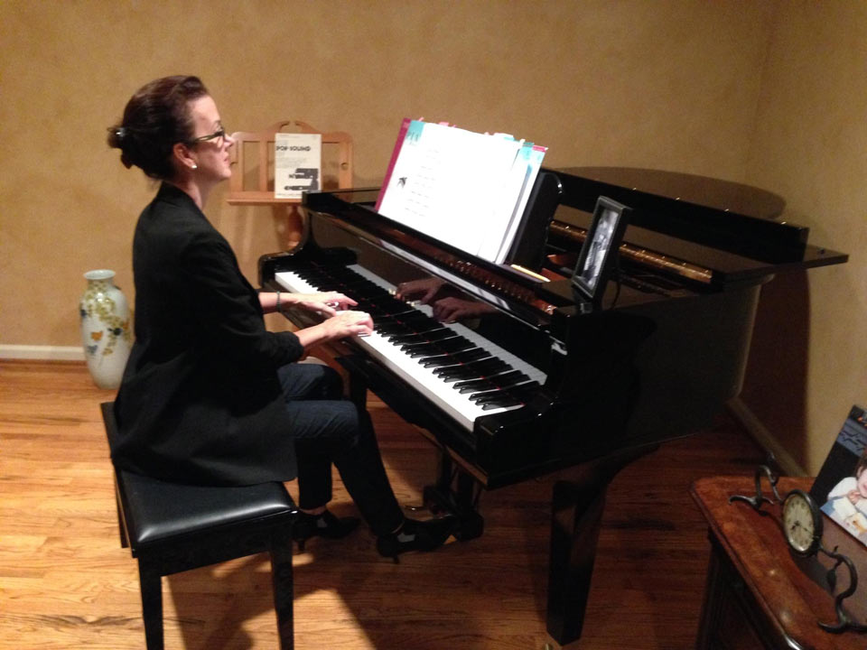 Adult student playing piano