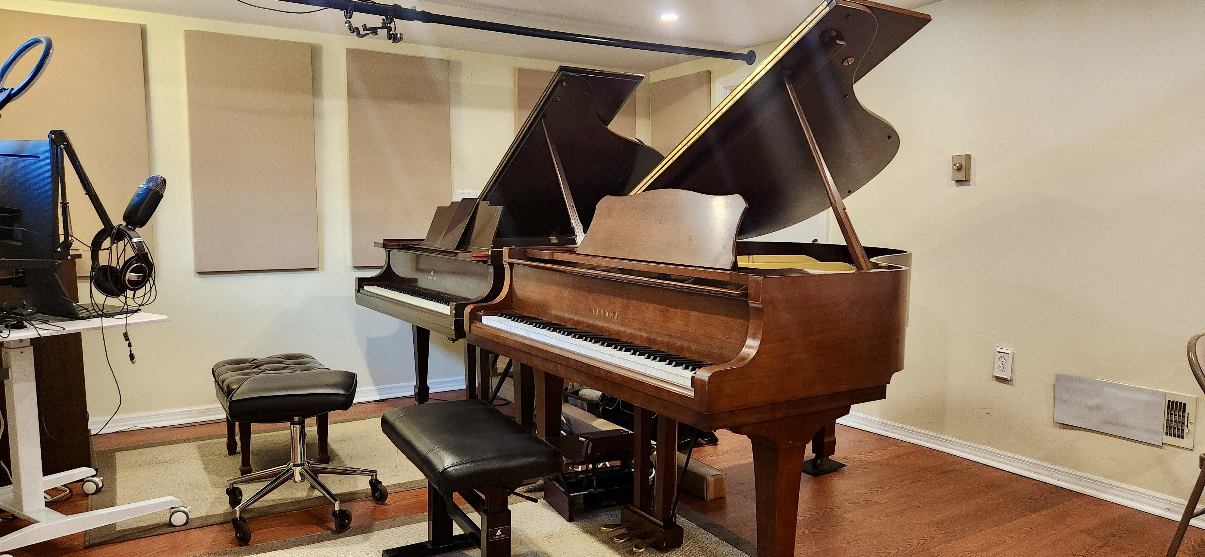 The IKM piano studio, featuring two baby grand pianos